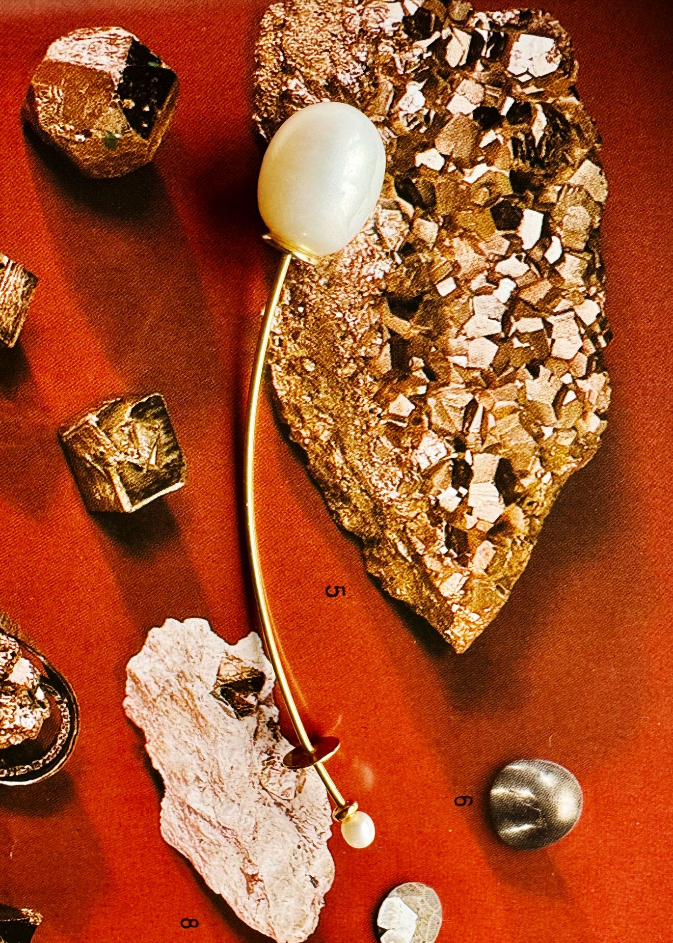 Floating Pearl on Pyrite