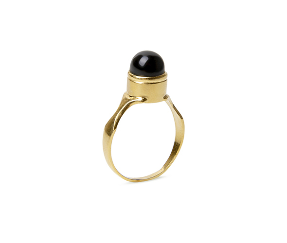 Gold round signet ring set with a black onyx